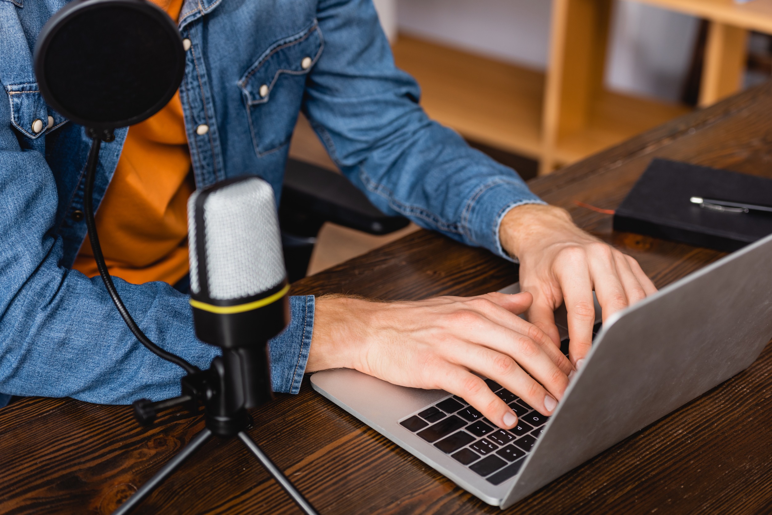 Man working on transcription for branded podcasting