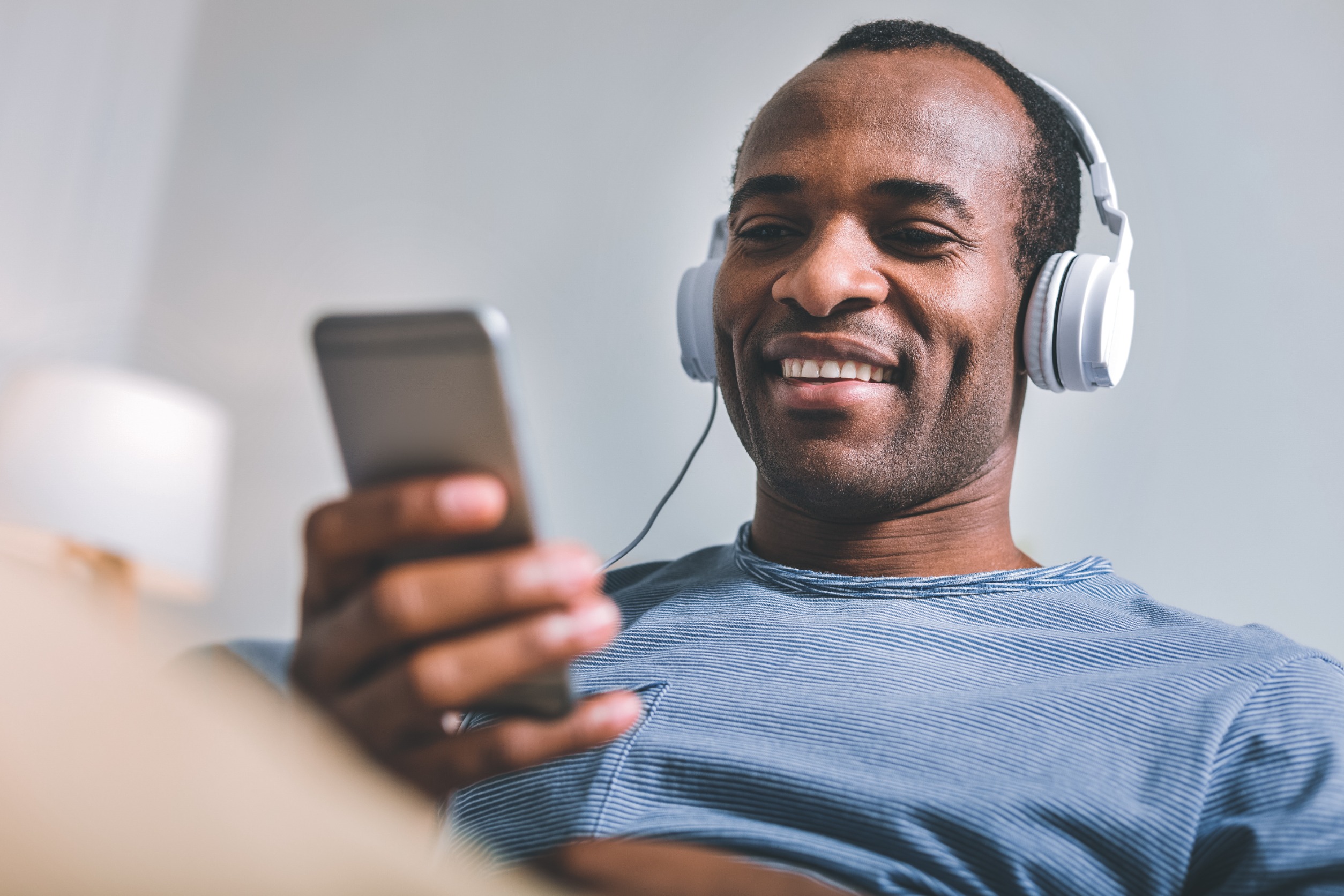 Man listening to a branded podcast