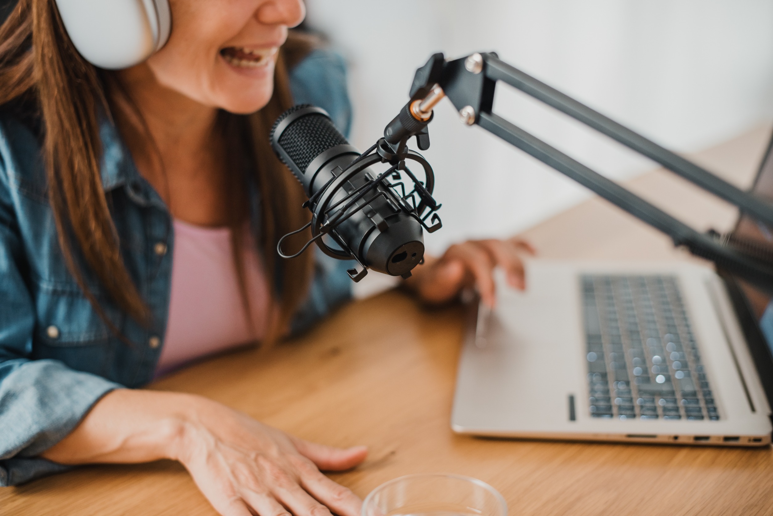 Woman recording a branded podcast